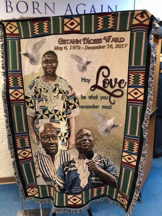 A tapestry honoring Getahn Ward, a business reporter for the Tennessean in Nashville who died at 45 on Dec. 16, greeted mourners at Born Again Church in Nashville on Saturday. The tapestry was created by the Highland Hills Funeral Home, a service the home provides, funeral director George Baker told Journal-isms. The tapestries take 36 to 48 hours to make. A scholarship in Ward’s name has been established for future journalism students at Tennessee State University. More than $30,000 has been raised; the goal is $50,000 by Jan. 15, said David Plazas, the Tennessean’s director of opinion and engagement. (David Plazas)